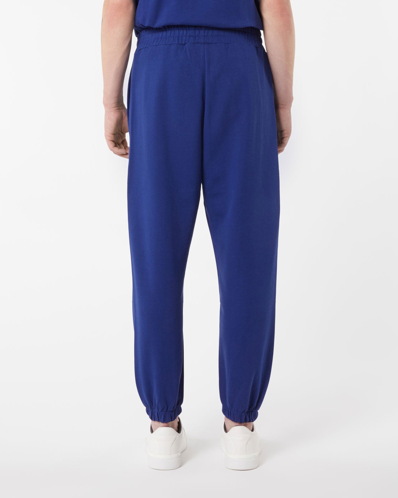 BLUE PANTS WITH EMBROIDERED FLAMING HEART