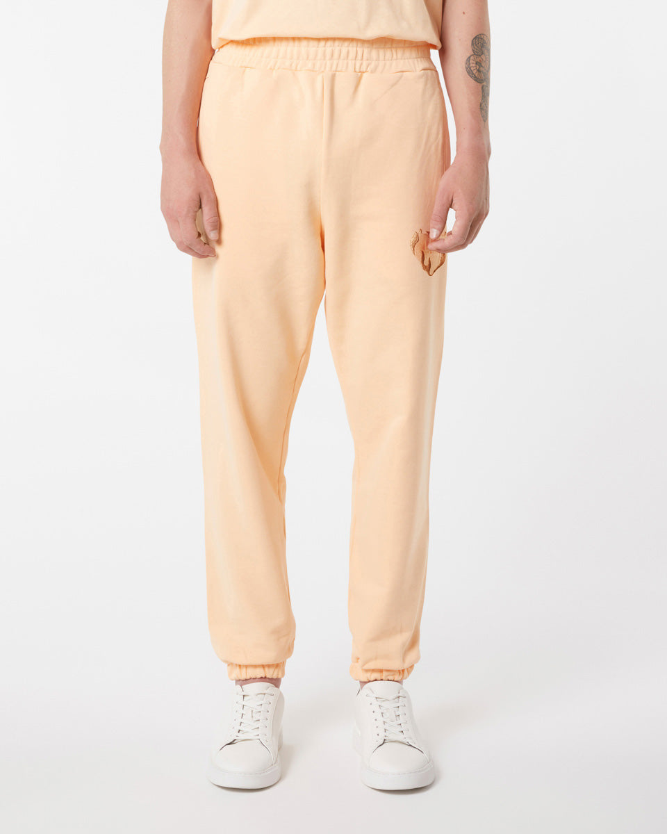 PEACH PANTS WITH EMBROIDERED FLAMING HEART