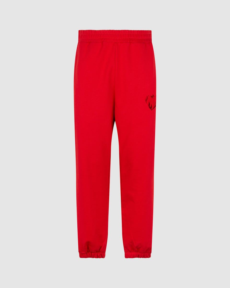RED PANTS WITH EMBROIDERED FLAMING HEART