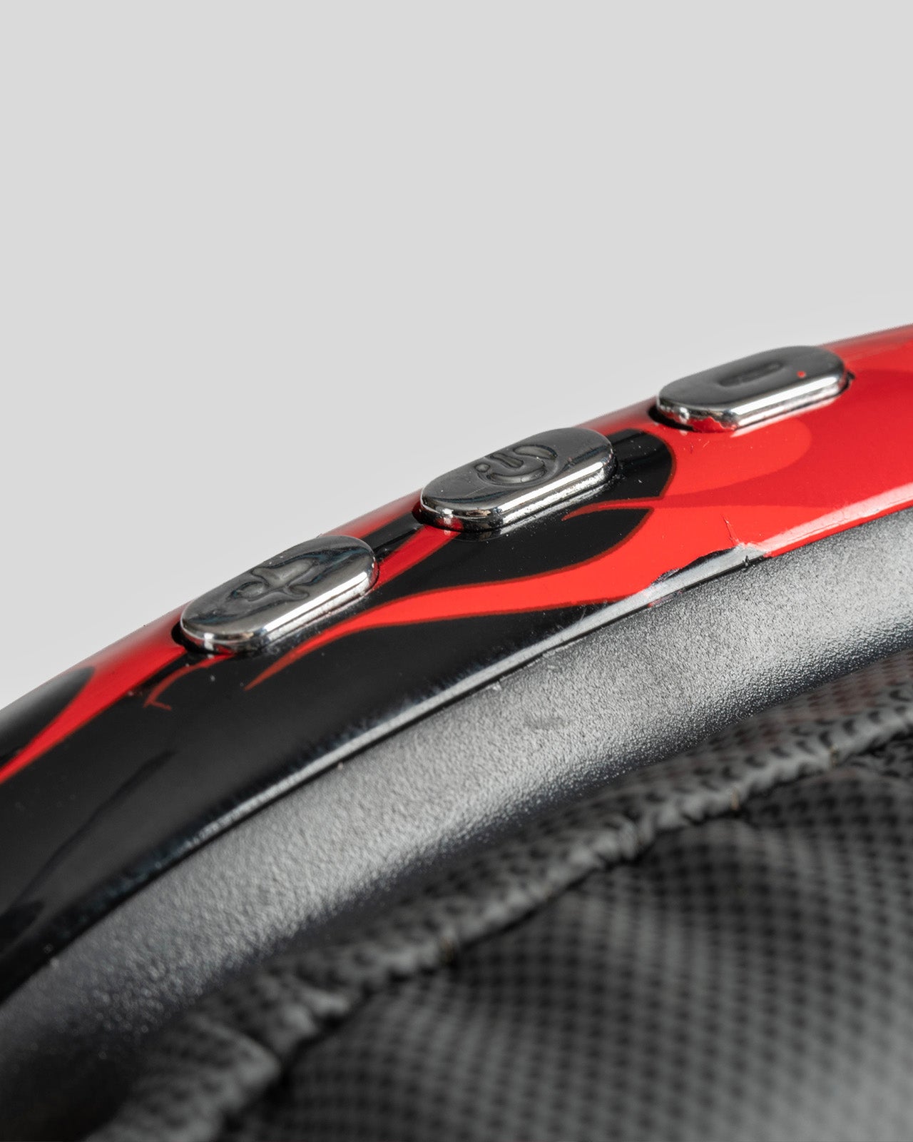 BLACK HEADPHONES WITH RED FLAMES AND WHITE LOGO