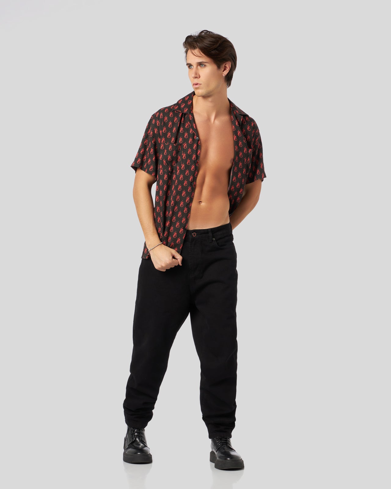 BLACK SHIRT WITH ALL OVER LOGO PRINT AND METAL LABEL