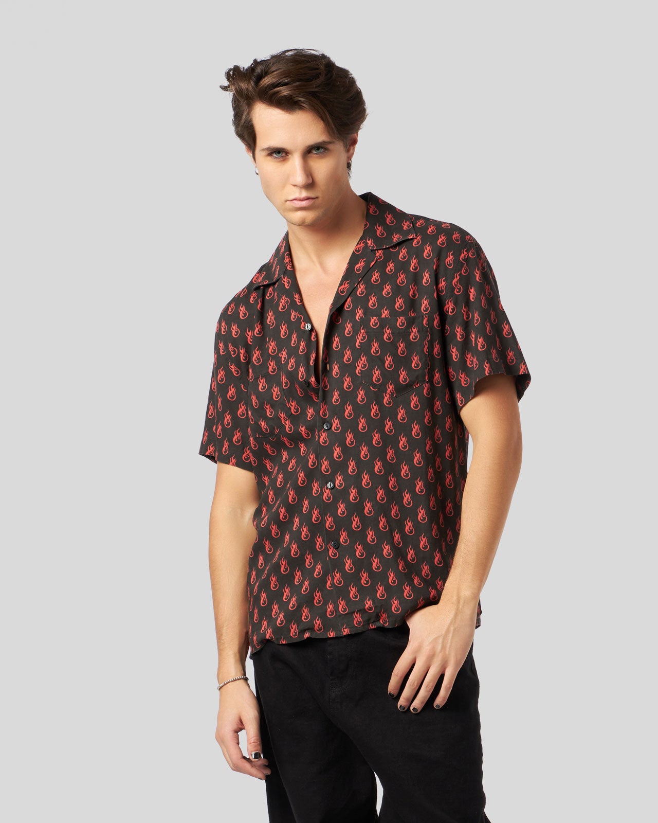 BLACK SHIRT WITH ALL OVER LOGO PRINT AND METAL LABEL