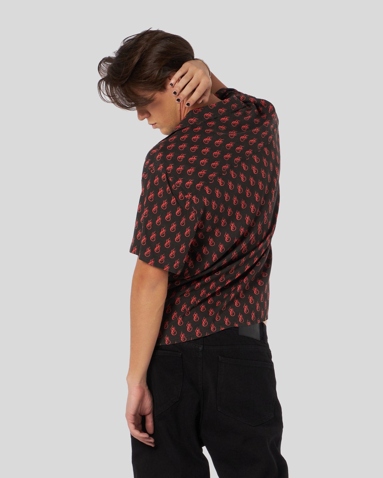 BLACK SHIRT WITH ALL OVER LOGO PRINT AND METAL LABEL