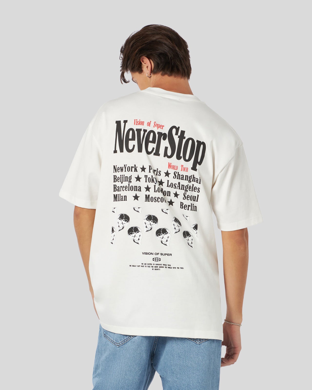 T-SHIRT BIANCA CON GRAFICA NEVER STOP