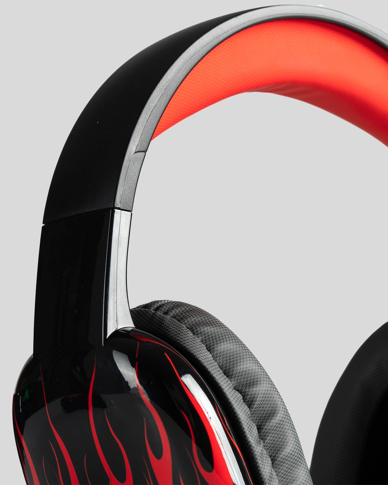 BLACK HEADPHONES WITH RED FLAMES AND WHITE LOGO