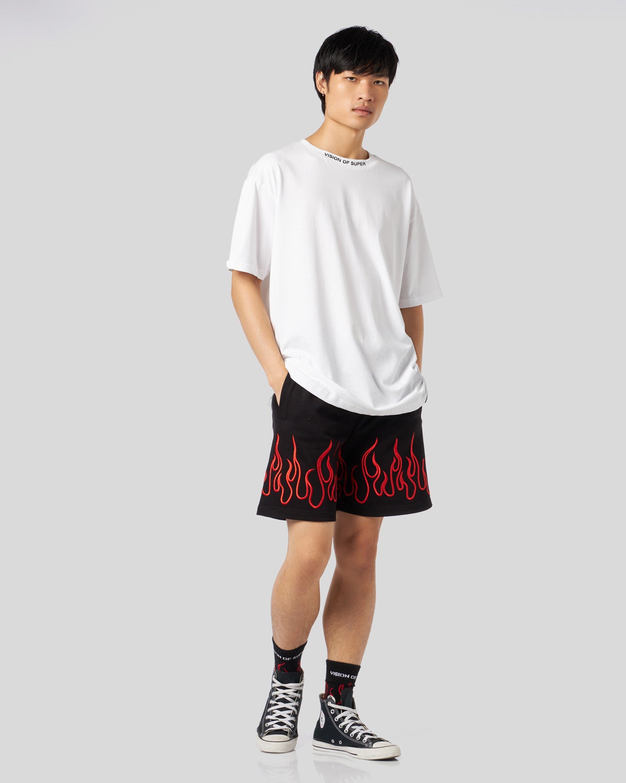 BLACK SHORTS WITH EMBROIDERED RED FLAMES