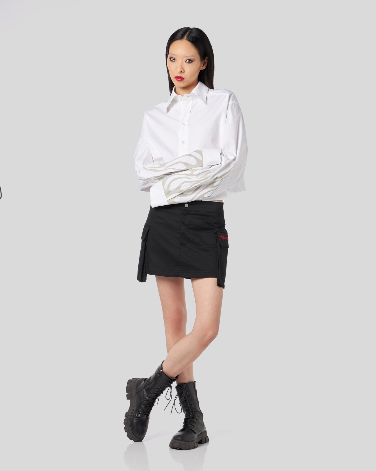BLACK CARGO SKIRT WITH EMBROIDERED GOTIC LOGO