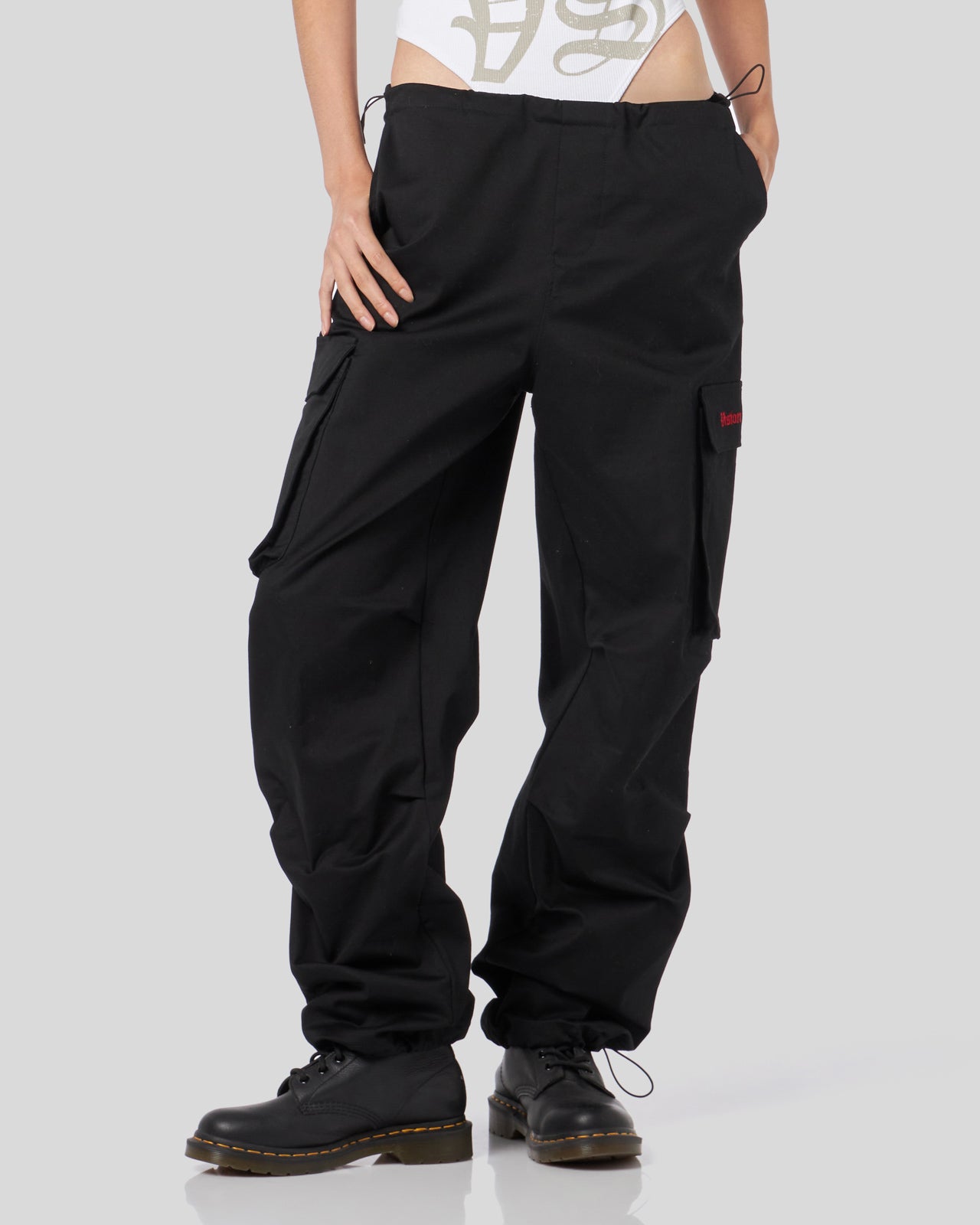 BLACK CARGO PANTS WITH EMBROIDERED GOTIC LOGO