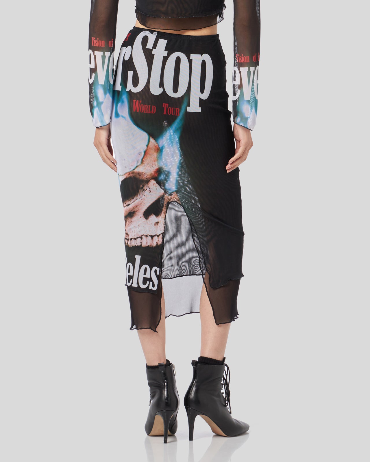 BLACK MIDI SKIRT WITH ALL OVER NEVER STOP PRINT