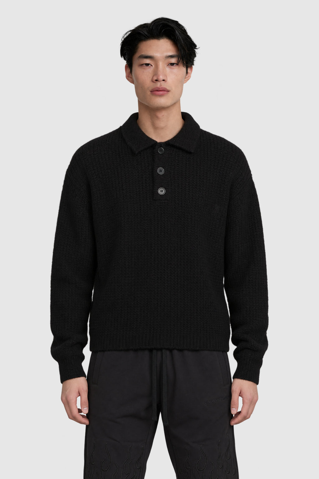 Polo in maglia grossa con alpaca – Nero – su modello, fronte