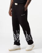 BLACK PANTS WITH WHITE EMBROIDERED FLAMES - Vision of Super